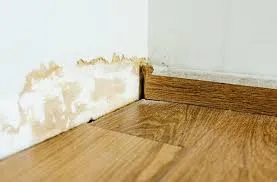 Warped flooring or damp drywall Weston Fl